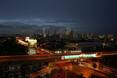 Illuminated cityscape at night