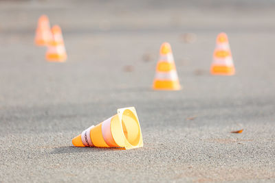 Yellow traffic cones on road