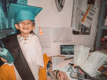 Portrait of a smiling young man working