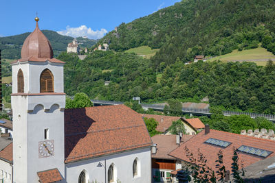 High angle view of trees and houses against sky