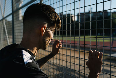 Portrait of young man looking away