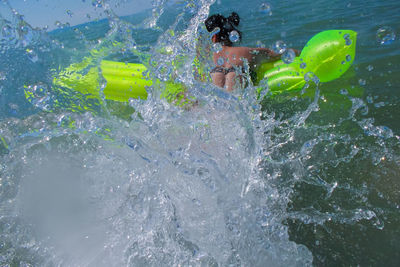 Man swimming in sea