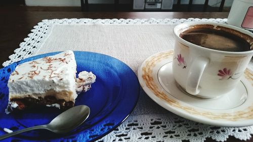 Close-up of coffee cup on table