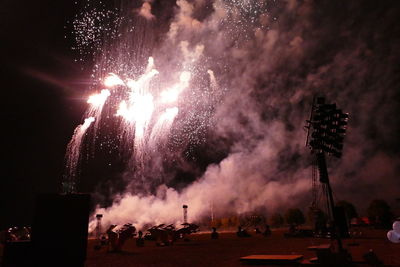 Firework display at night