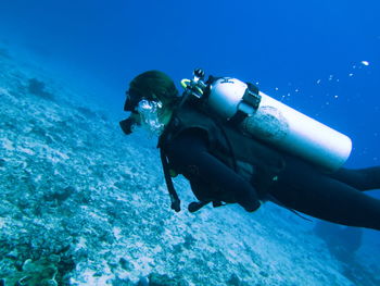 Man swimming in sea