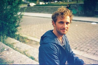 Portrait of a smiling young man outdoors