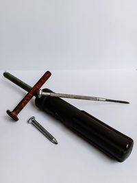 High angle view of pen on table against white background