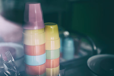Close-up of colorful drinking cups