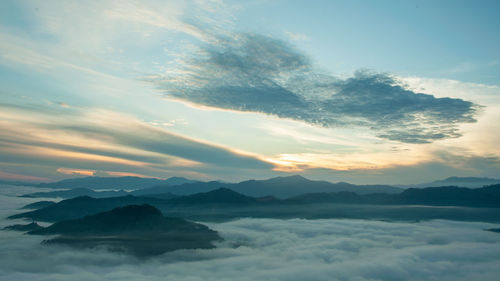 Scenic view of mountains against sky during sunset