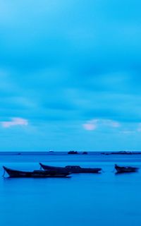 Scenic view of blue sea against sky