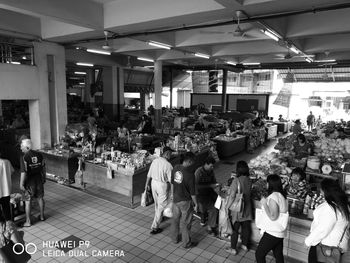 People walking in market