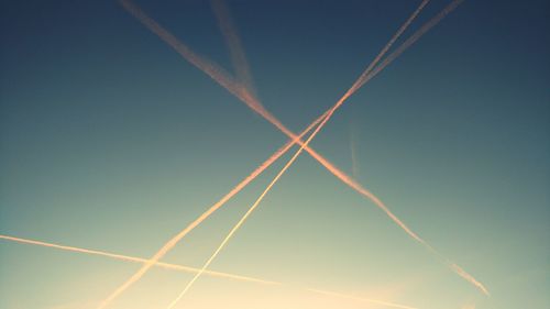 Low angle view of vapor trail against clear sky