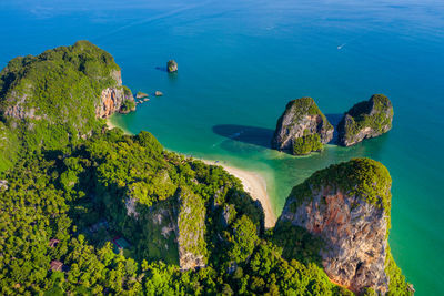 High angle view of rocks on sea shore