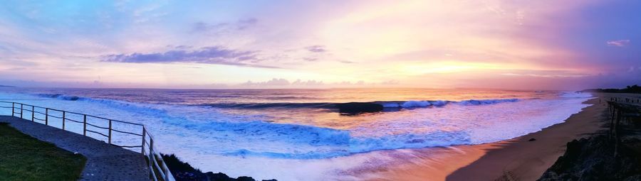 Panoramic view of sea against sky during sunset