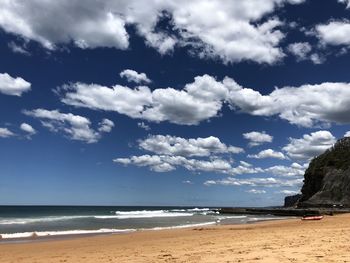 Scenic view of beach against sky