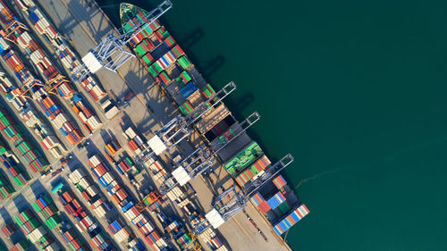 Aerial view container ship freight shipping at port, global business logistic import and export.