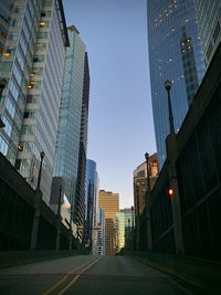 Low angle view of modern buildings against clear sky