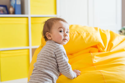 Portrait of cute girl at home