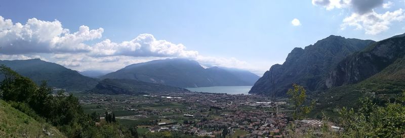 Scenic view of mountains against cloudy sky