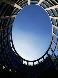 Low angle view of building against clear blue sky