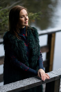 Portrait of young woman looking away