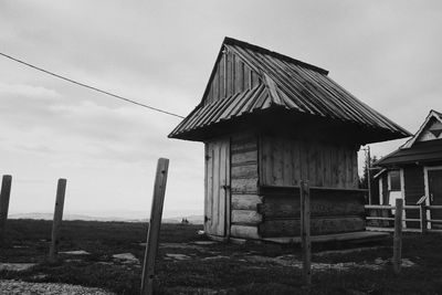 House on field against sky