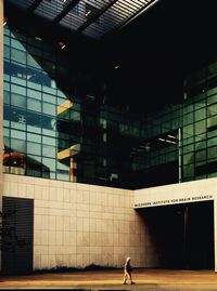 Woman standing in front of building