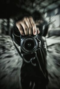 Close-up of man with camera