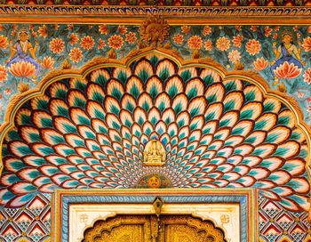 Low angle view of ornate ceiling of building