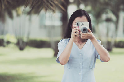 Portrait of man photographing