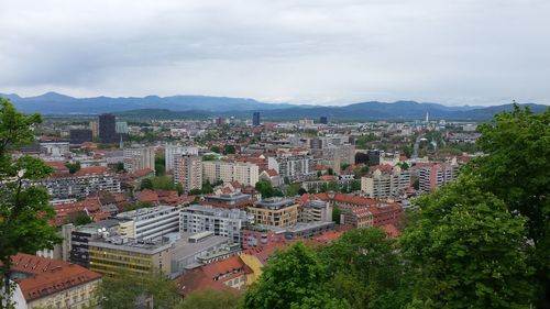 High angle view of buildings in city against sky