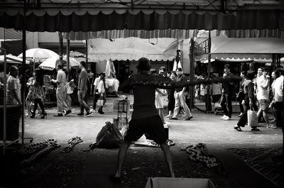 People at market stall