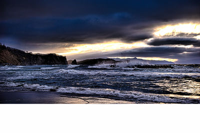 Dramatic sky over sea during sunset