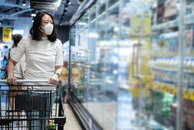Woman standing in store