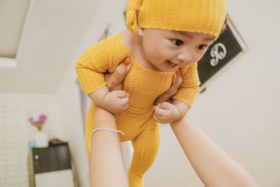 Portrait of cute boy at home