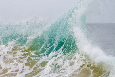 Close-up of sea waves on sunny day