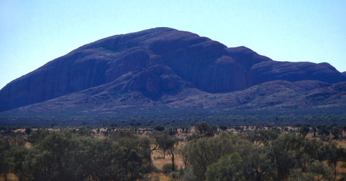 Scenic view of rocky mountains against clear sky