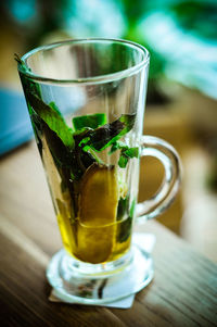 Close-up of tea in glass on table