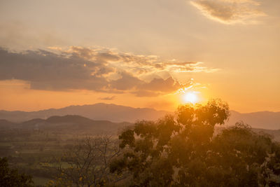 Scenic view of mountains against sky during sunset