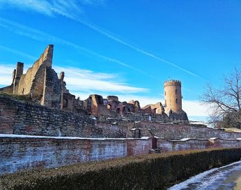 Old ruin building against sky