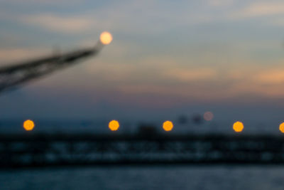 Scenic view of sea against orange sky