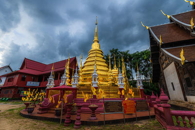 Low angle view of temple against building