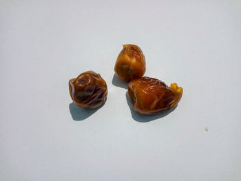 High angle view of fruits on white background