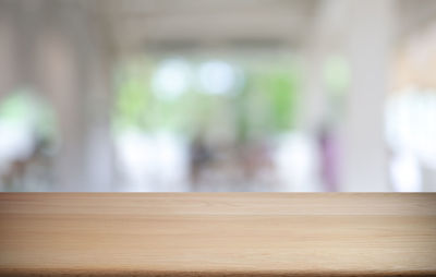 Close-up of window on wooden table