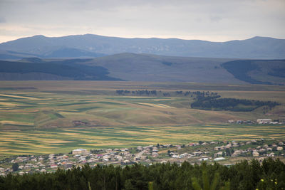 View and landscape of the village and fields in georgia, colorful farms and nature