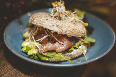 Burger served on plate at cafe