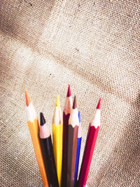 High angle view of colored pencils on table