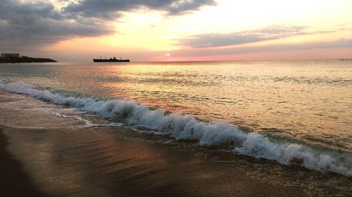 Scenic view of sea at sunset