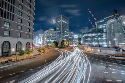 Light trails on city street at night