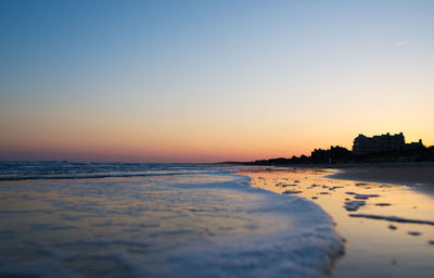 View of beach at sunset